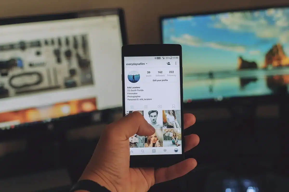 A smartphone with a large display sitting on a minimalist desk, screen glowing with vibrant colors, shallow depth of field emphasizing the screen's 120Hz refresh rate smoothness.